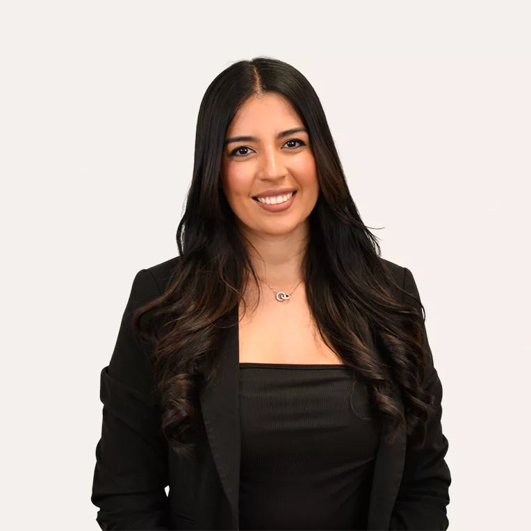 Photo of Valentina Cardona Obando. Image of woman with dark hair wearing a black shirt and blazer on a white background.