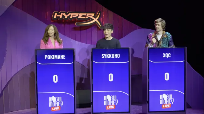 Pokimane, Sykkuno, and xQc on stage at Mogul Money Live with Jeopardy-like podiums and the HyperX Gaming logo in the background in front of a purple curtain.